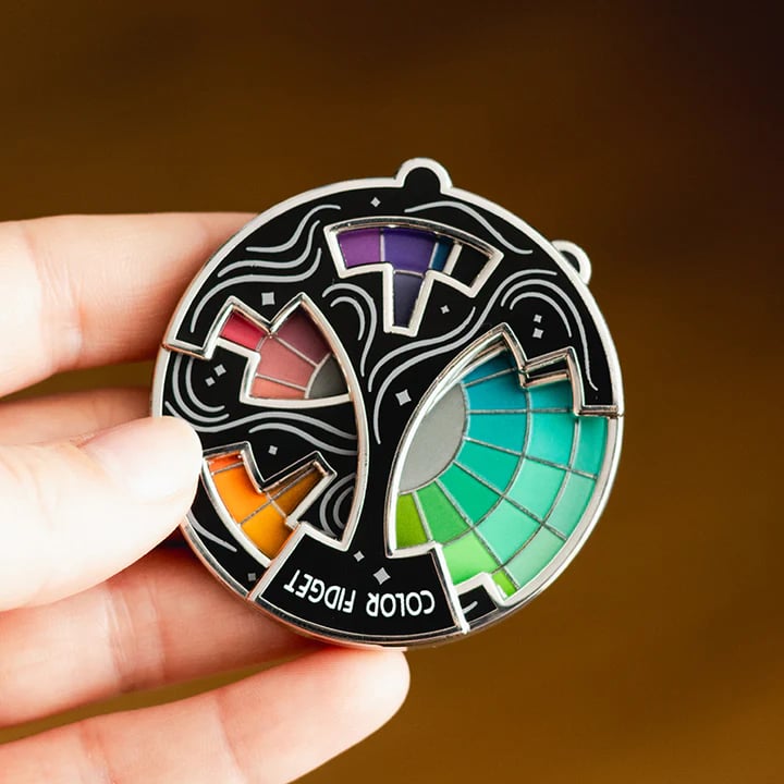 ChromoSpin Pin – Das Farbenrad, das niemals stillsteht